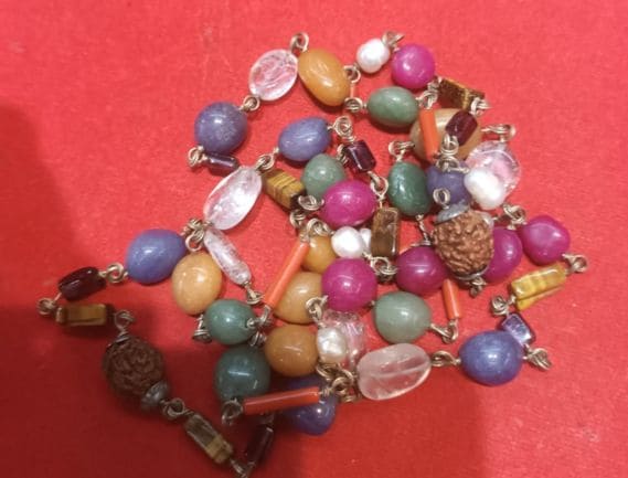 Manufacturer, Exporter, Importer, Supplier, Wholesaler, Retailer, Trader of Navratna Mala in Noida, Uttar Pradesh, India.