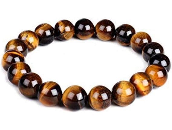 Manufacturer, Exporter, Importer, Supplier, Wholesaler, Retailer, Trader of Tiger Eye Bracelet in Noida, Uttar Pradesh, India.